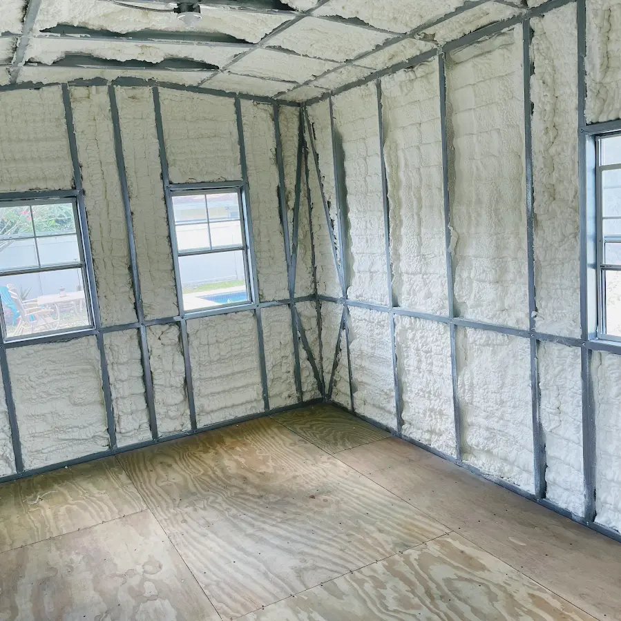 Closed-cell spray foam insulation applied to wall cavities in a residential project in Crawfordsville